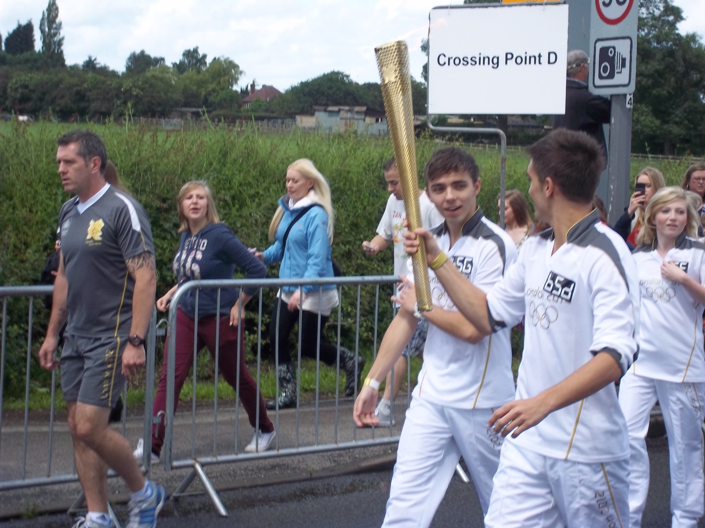 The Wanted carrying the Olympic torch